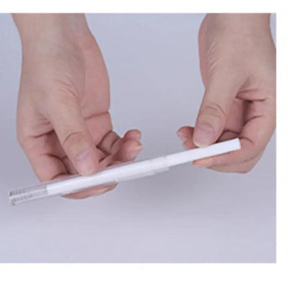 Two hands hold a slim USB ultrasonic mini air humidifier with projection night lights.