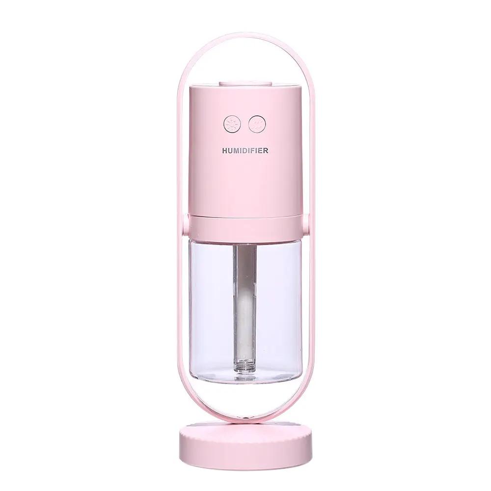 Pink USB ultrasonic mini air humidifier with projection night lights for home or office.
