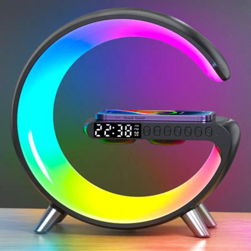 G-shaped LED lamp with Bluetooth speaker, wireless charger, app control, and built-in clock on rainbow-lit ring.