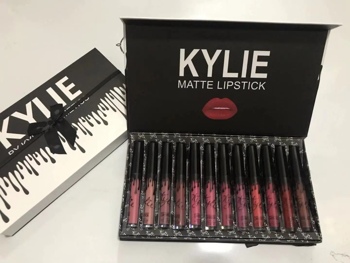 12 Piece Bow Lip Gloss Set With Liquid Lipsticks For Bold Evening Or Soft Daytime Looks by null