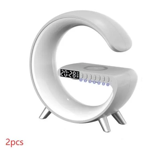 G-shaped LED lamp with Bluetooth speaker, wireless charger, and app control; crescent lamp with a digital clock display.