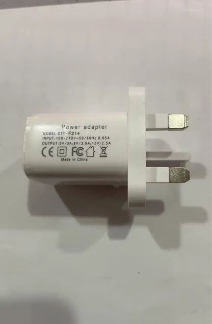 White CTY-F214 wall power adapter with two flat prongs and printed input/output specs.
